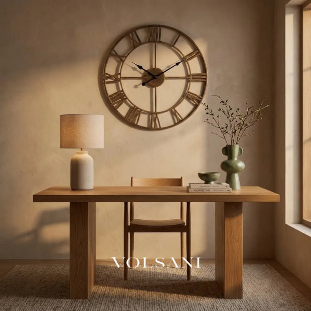 SONJA 3D metal Roman numeral wall clock above a desk in a home office