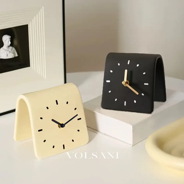 MAEVE arched desk clocks in cream and black side by side