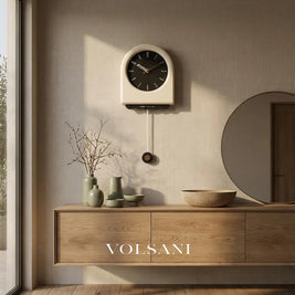JOOST cream pendulum wall clock above a console table