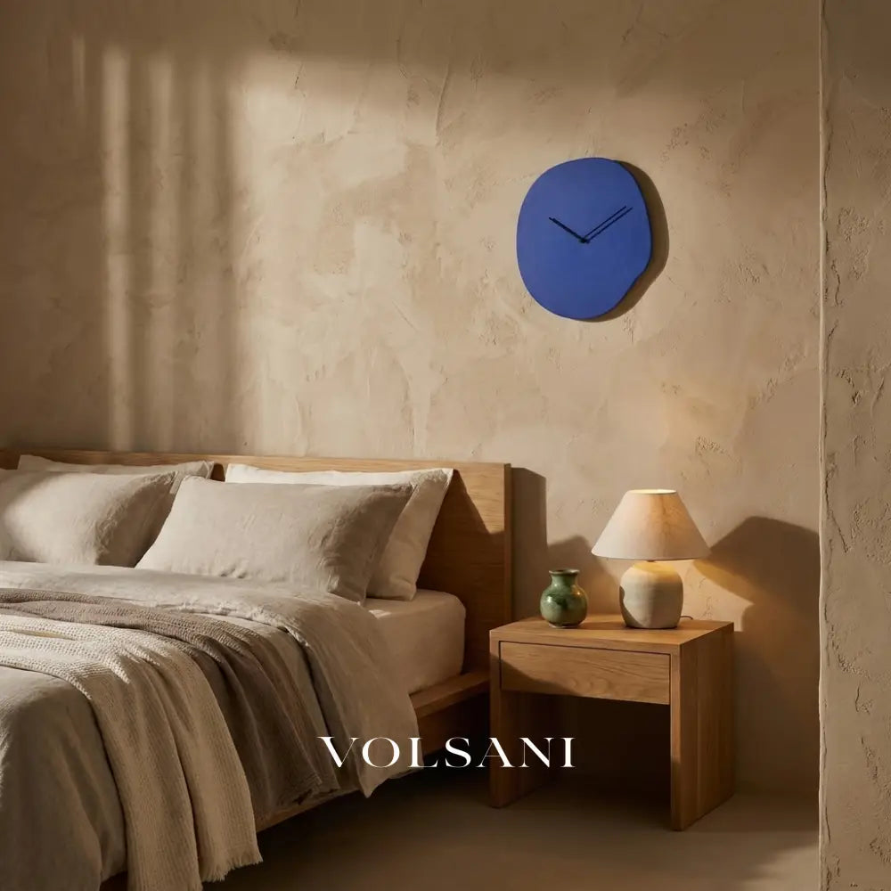 EERO minimalist wall clock in blue in a bedroom