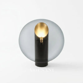 Postmodern glass table lamp on a white background