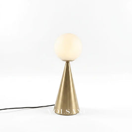 Gold glass cone table lamp on a white background