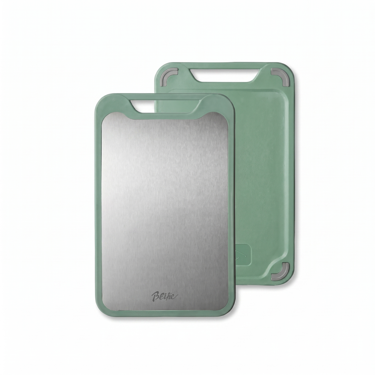 Green double sided cutting board on a white background