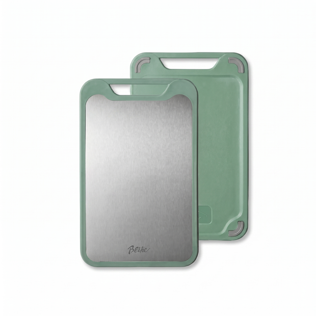 Green double sided cutting board on a white background