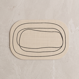Oval bath mat Style 1, overhead on stone floor