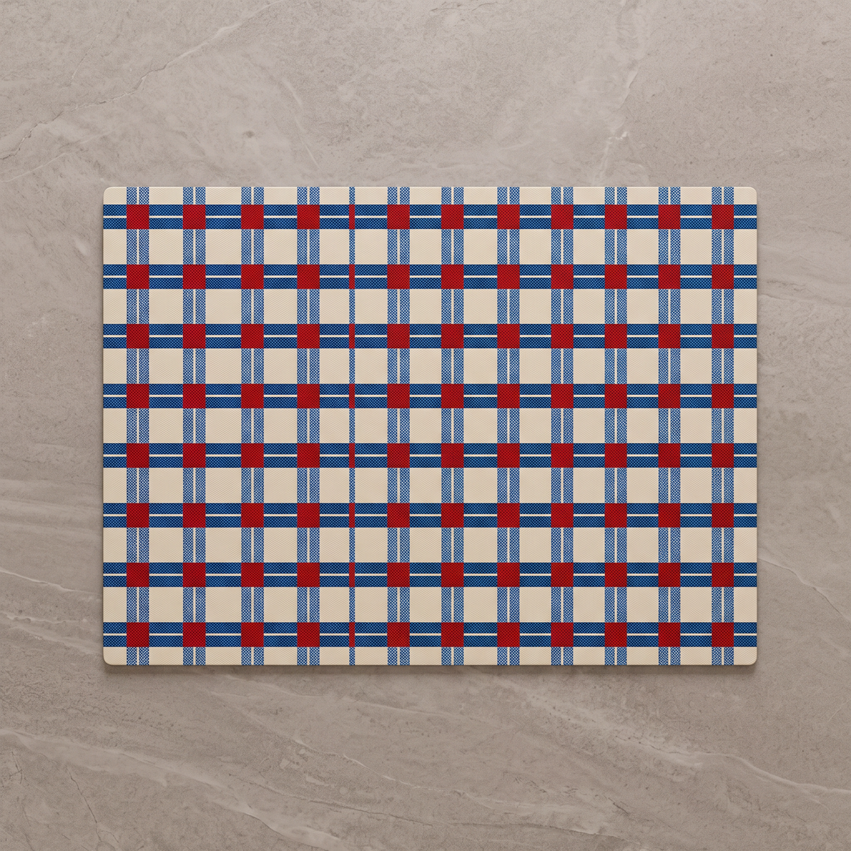 Red and Blue Grid Bauhaus bath mat, overhead on stone floor