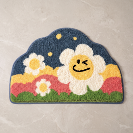 Smile design flower shaped bath mat, overhead on stone floor