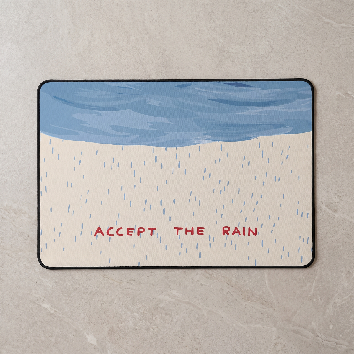Blue edge quick dry shower mat, overhead on stone floor