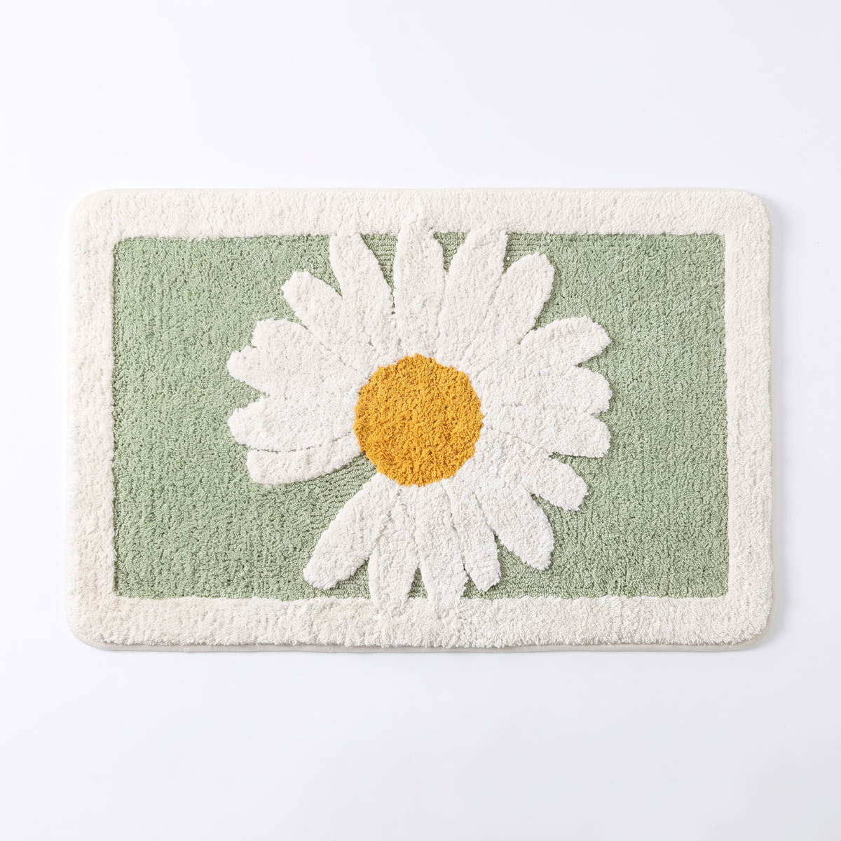 Daisy plush bath mat on a white background, overhead