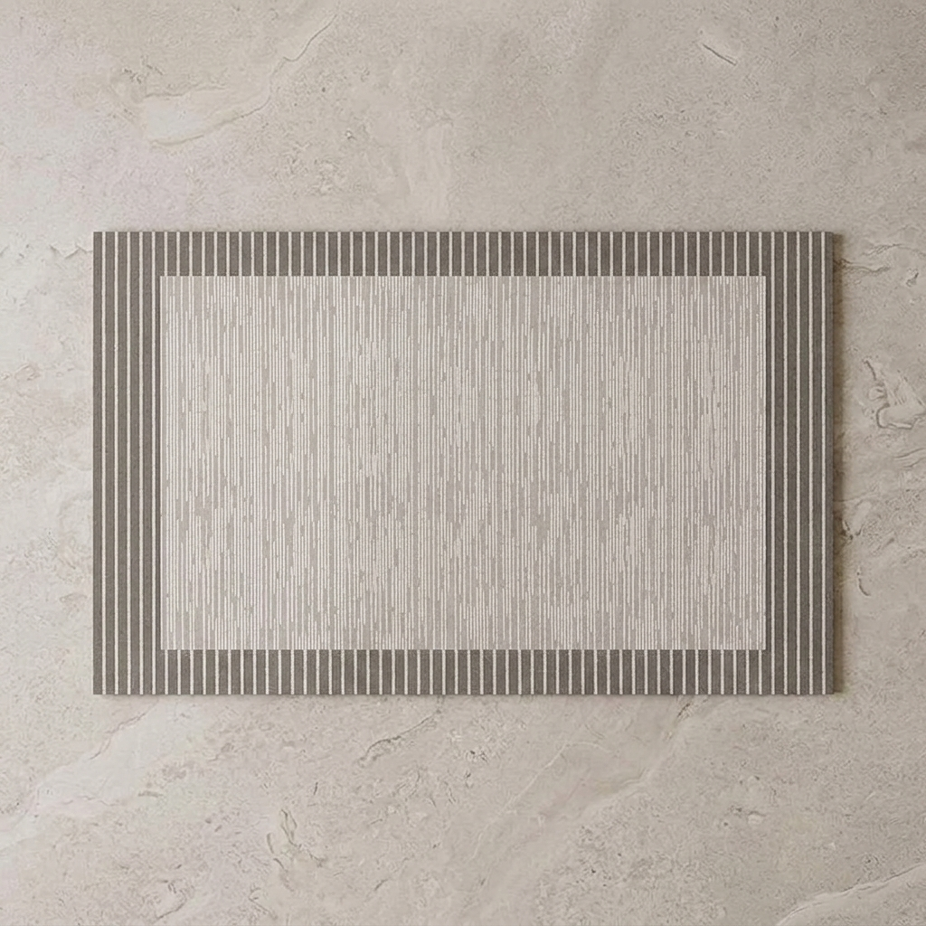 Fine Line Border diatomite bath mat on stone floor, overhead