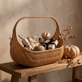Woven basket filled with Halloween candy by the door