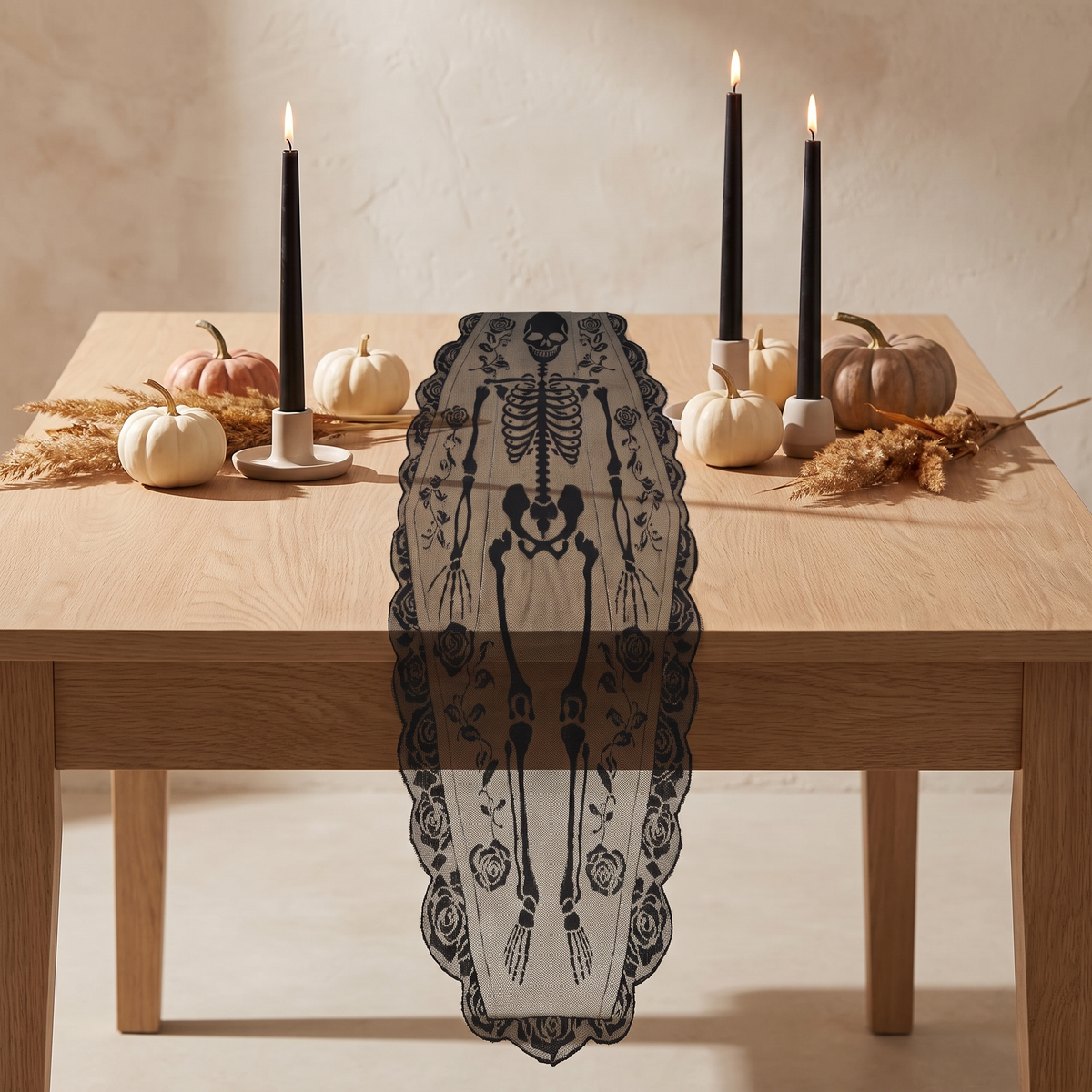 Black lace skeleton runner on an oak dining table