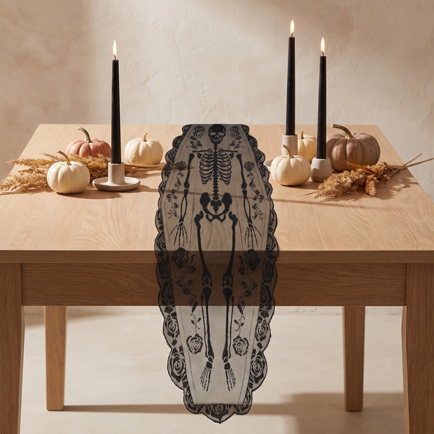 Black lace skeleton runner on an oak dining table