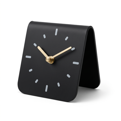 MAEVE arched acrylic desk clock in black with brass hands on a white background