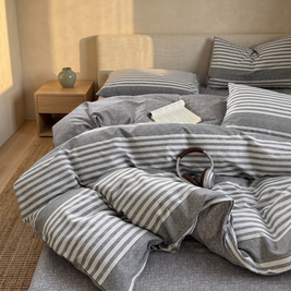 Gray stripe cotton duvet cover set in a Japandi bedroom