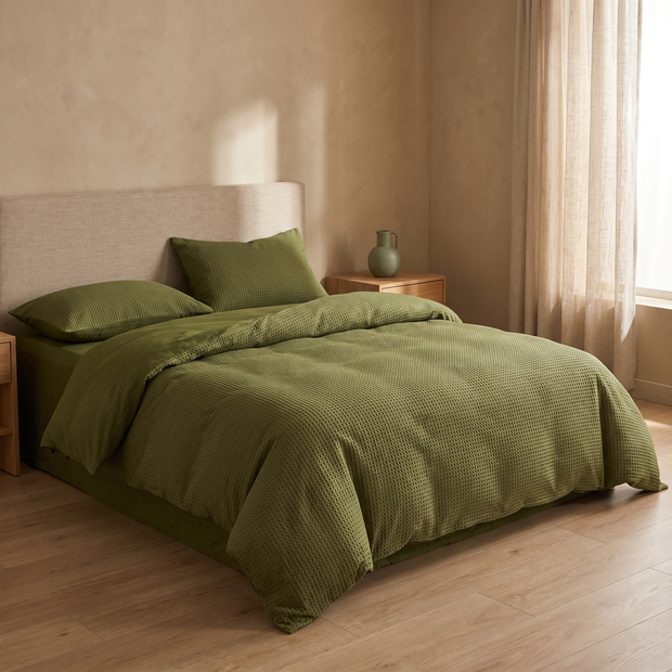 Olive Green cotton waffle weave bedding set in a Japandi bedroom