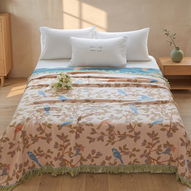 Blush Bird Print cotton jacquard throw blanket in a Japandi interior