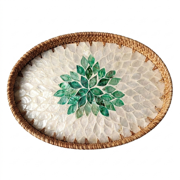 Rattan serving tray with green leaf shell inlay on white background