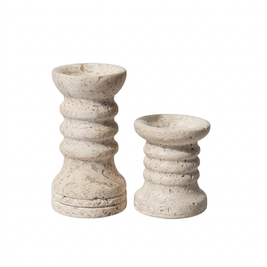Set of 2 ribbed travertine candle holders on white background