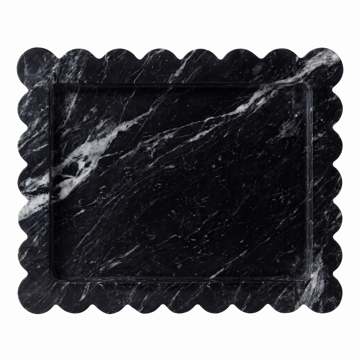 Black scalloped marble tray on white background