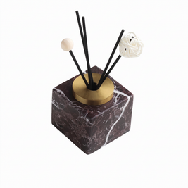 Square dark brown marble incense holder on white background