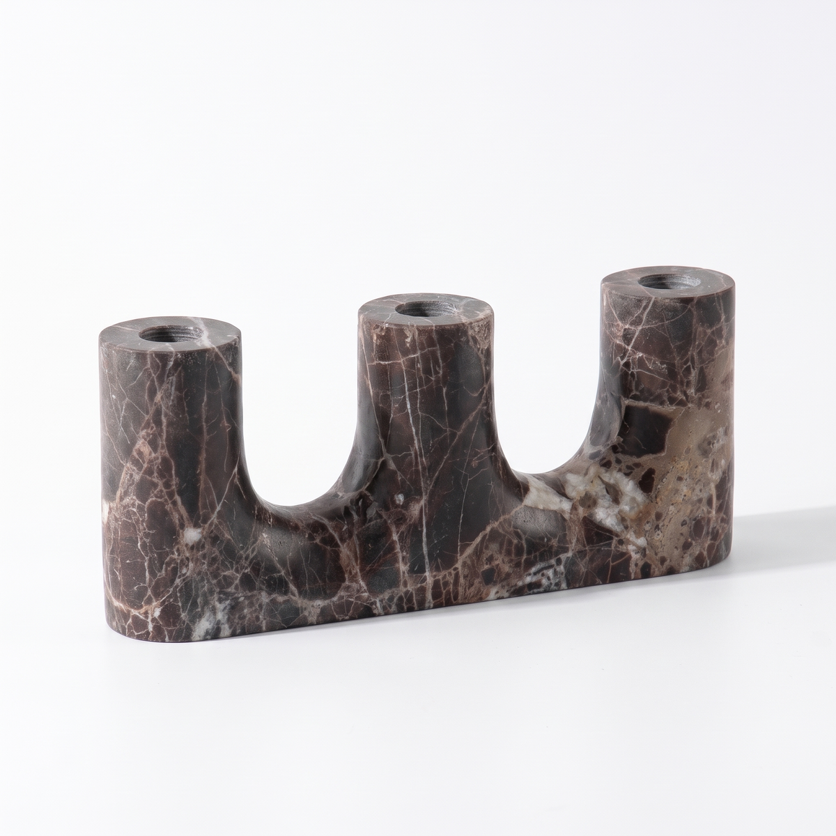 Brown stone candle holder on white background