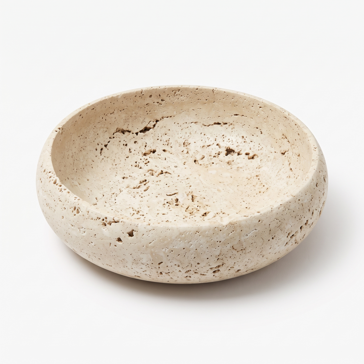 Round travertine-look marble catchall bowl on white background