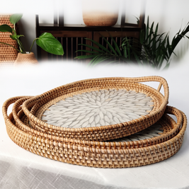 Rattan serving tray with white petal shell inlay on white background