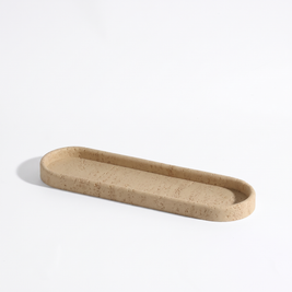 Long oval sandstone vanity tray on white background