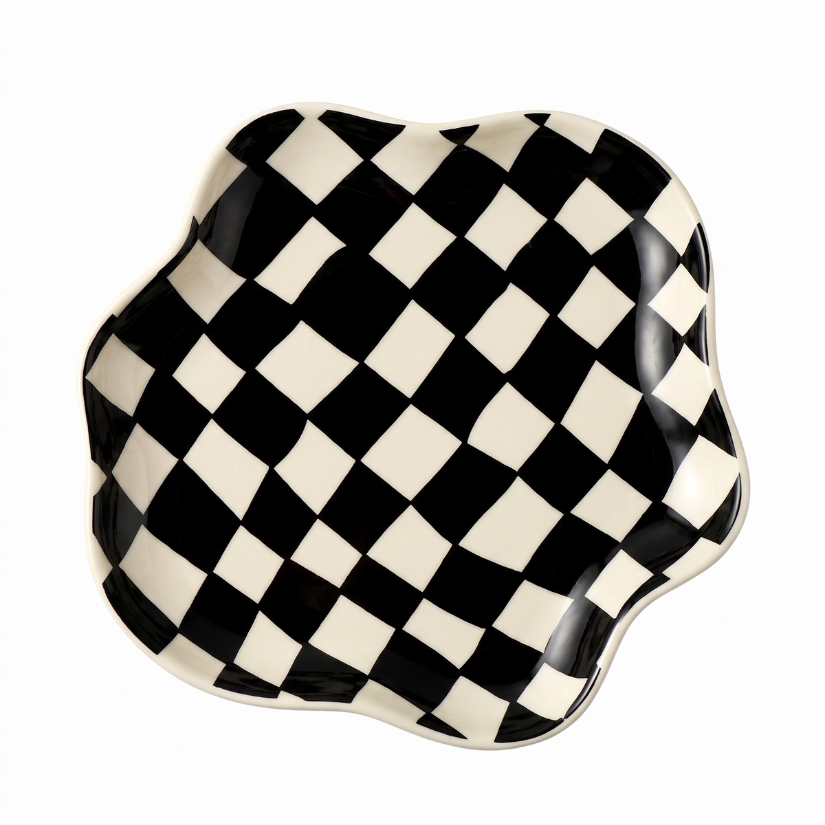 Black checkered ceramic tray on white background