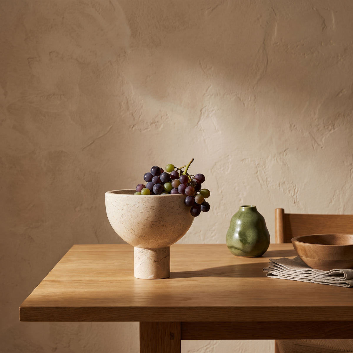 Marble footed cup styled on an oak dining table