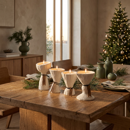 Concrete candle holders on a Christmas dining table