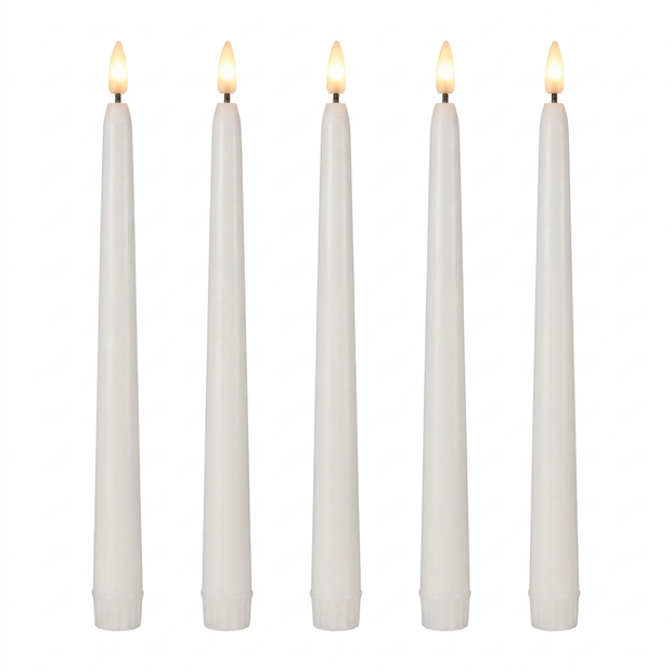 Set of flameless LED taper candles on a white background