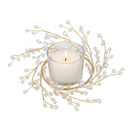 Gold branch candle ring with acrylic gems on a white background