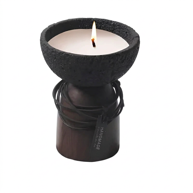 Cement and wood candle bowl on a white background