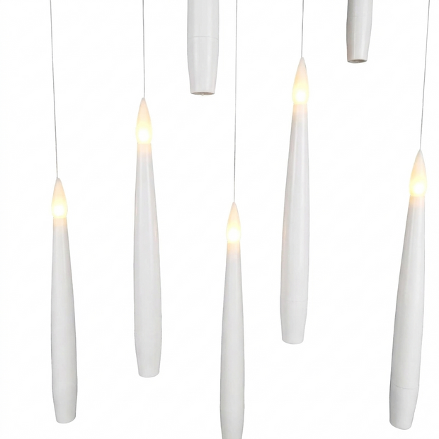 Set of flameless LED floating candles on a white background