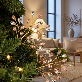 Beaded pearl and crystal look Christmas tree picks in a Japandi interior, tucked into the branches of a Christmas tree