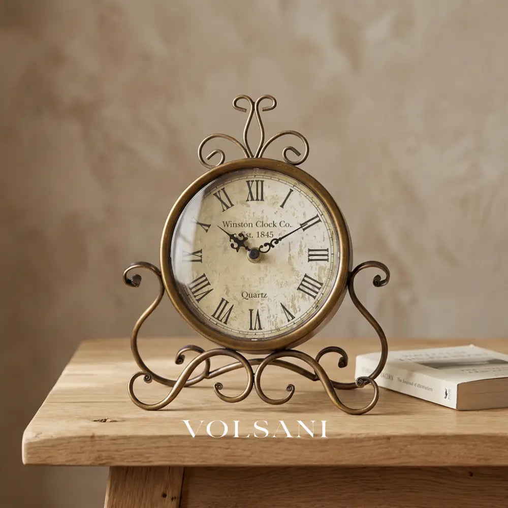 RENZO iron desk clock on an oak surface