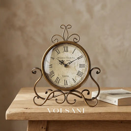 RENZO iron desk clock on an oak surface