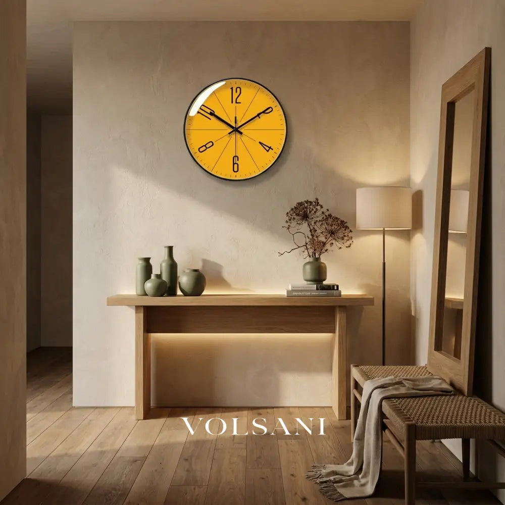 Modern wall clock with abstract dial above a console table in a hallway