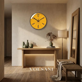 Modern wall clock with abstract dial above a console table in a hallway
