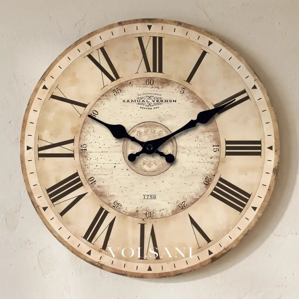 JULES antique Roman numeral wall clock on a plaster wall