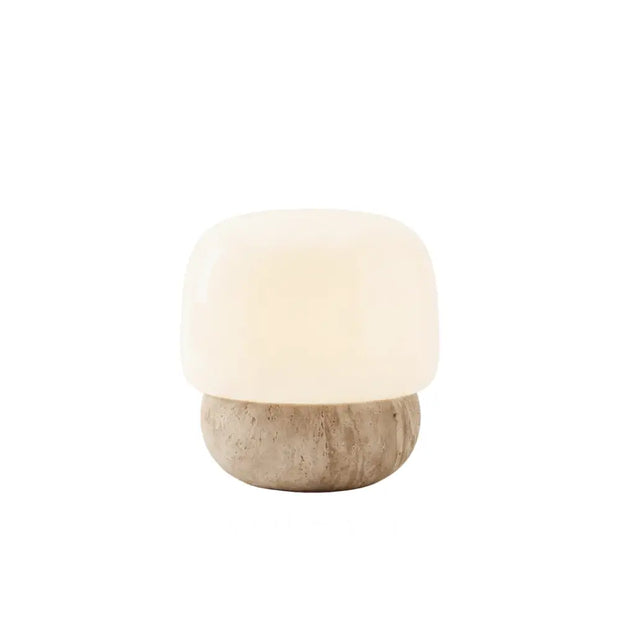 Travertine mushroom table lamp on a white background