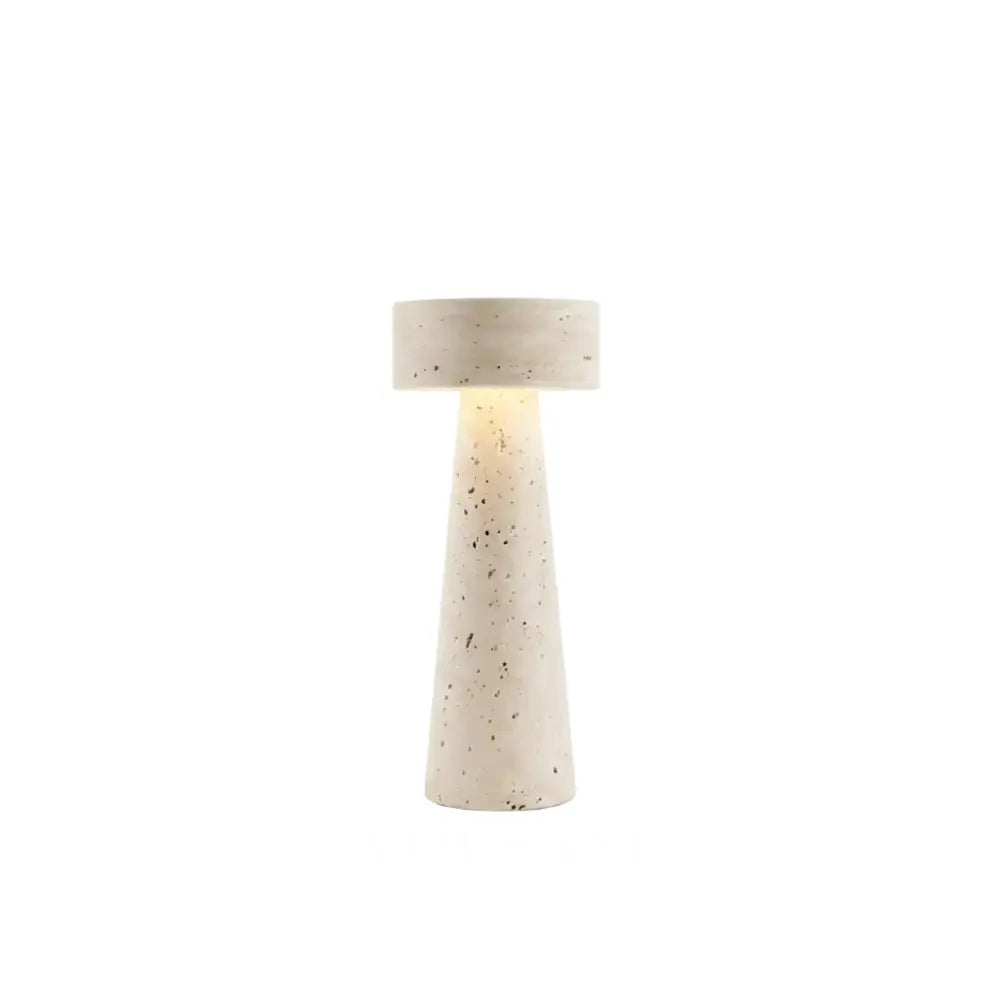 Travertine table lamp on a white background