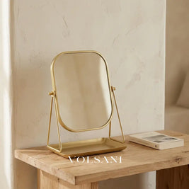 AURA vanity mirror with storage tray on an oak surface
