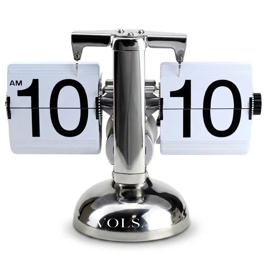 DINO vintage flip clock in silver and white on white background